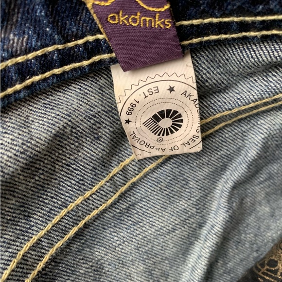 AKADEMIKS AKDMKS DARK DENIM MINI SKIRT WITH FAUX FUR TRIM AND BRAND GRAPHICS - Picture 7 of 7